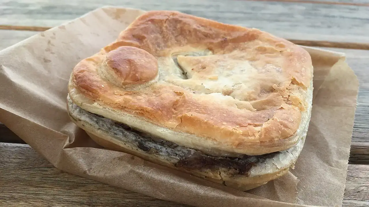 Meat pie in a paper bag